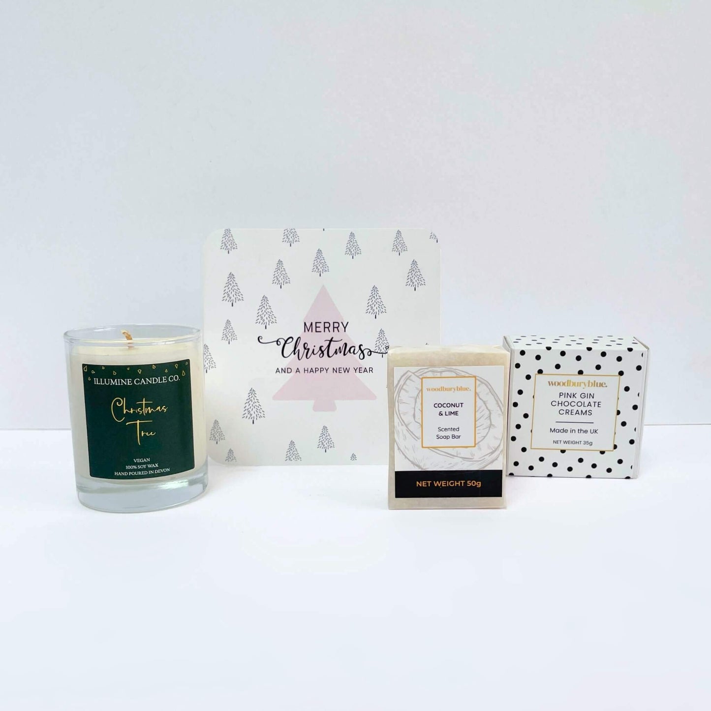 Warm Wishes Christmas Gift with Christmas Tree candle, coconut soap, pink gin chocolate creams and a Merry Christmas notecard