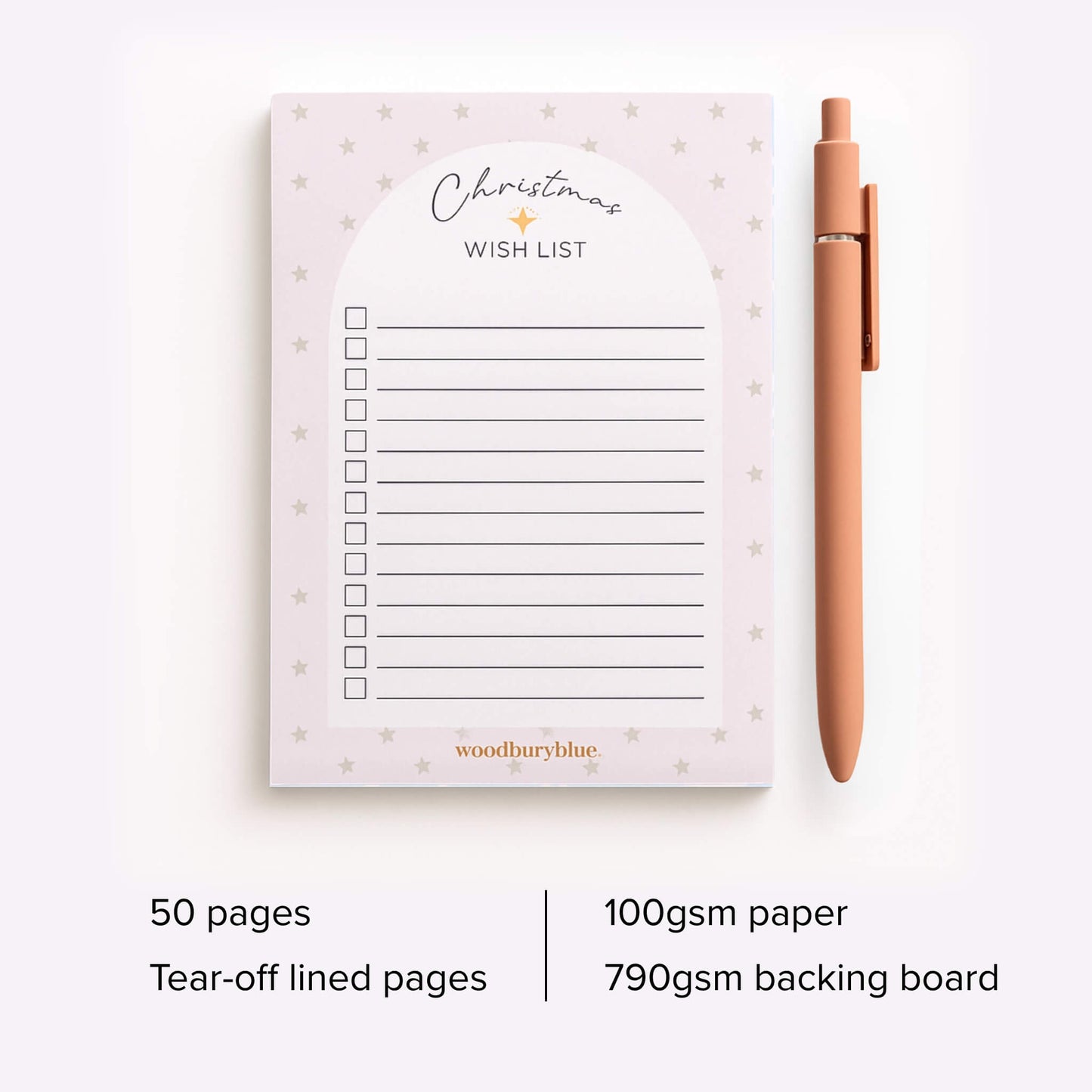 A6 Christmas Wish List notepad by Woodbury Blue with pale pink star design and matching pen, featuring 50 tear-off lined pages on 100gsm paper with a 790gsm grey-board backing.