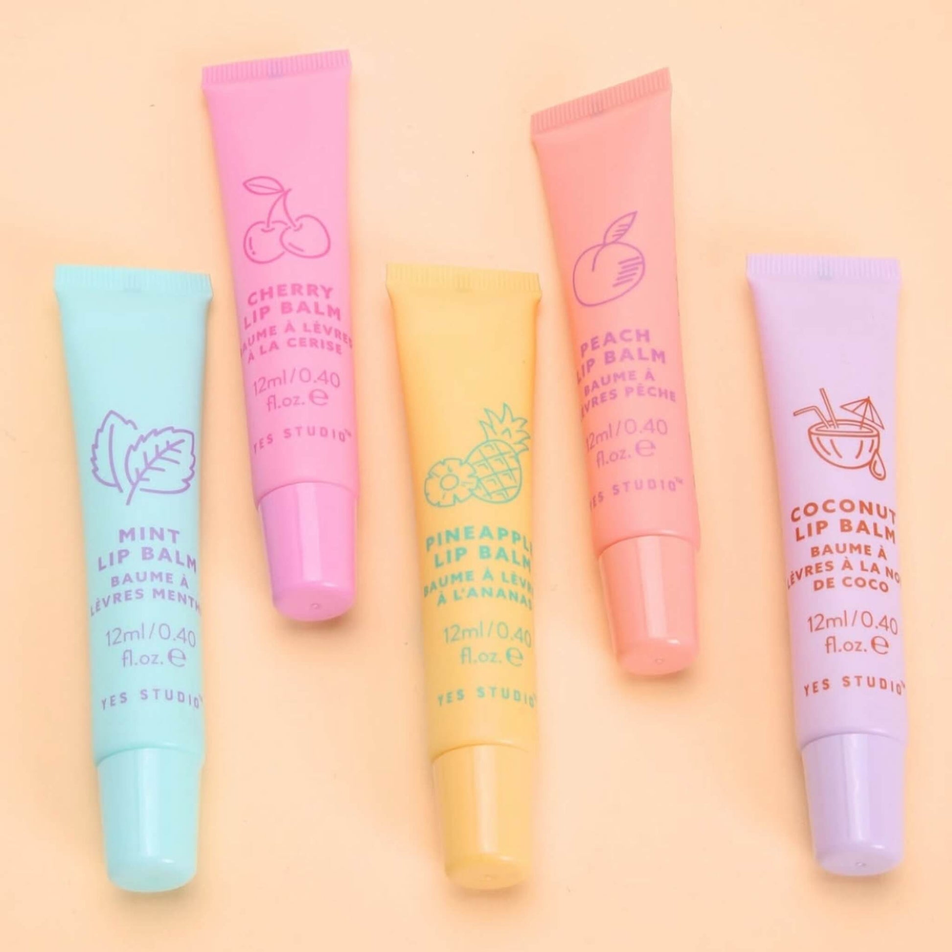 Fruit drop lip balms in a variety of scents