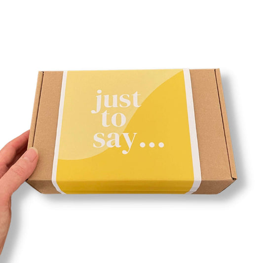 Eco-friendly kraft gift box with yellow just to say sleeve