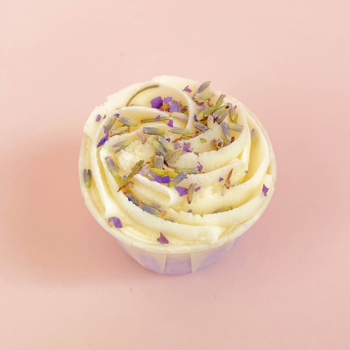 Close-up of Wild Olive lavender bath melt topped with dried petals – moisturising and handmade in England