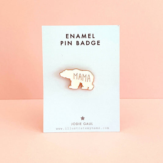 Mama bear enamel pin badge on white backing card with a pastel pink background