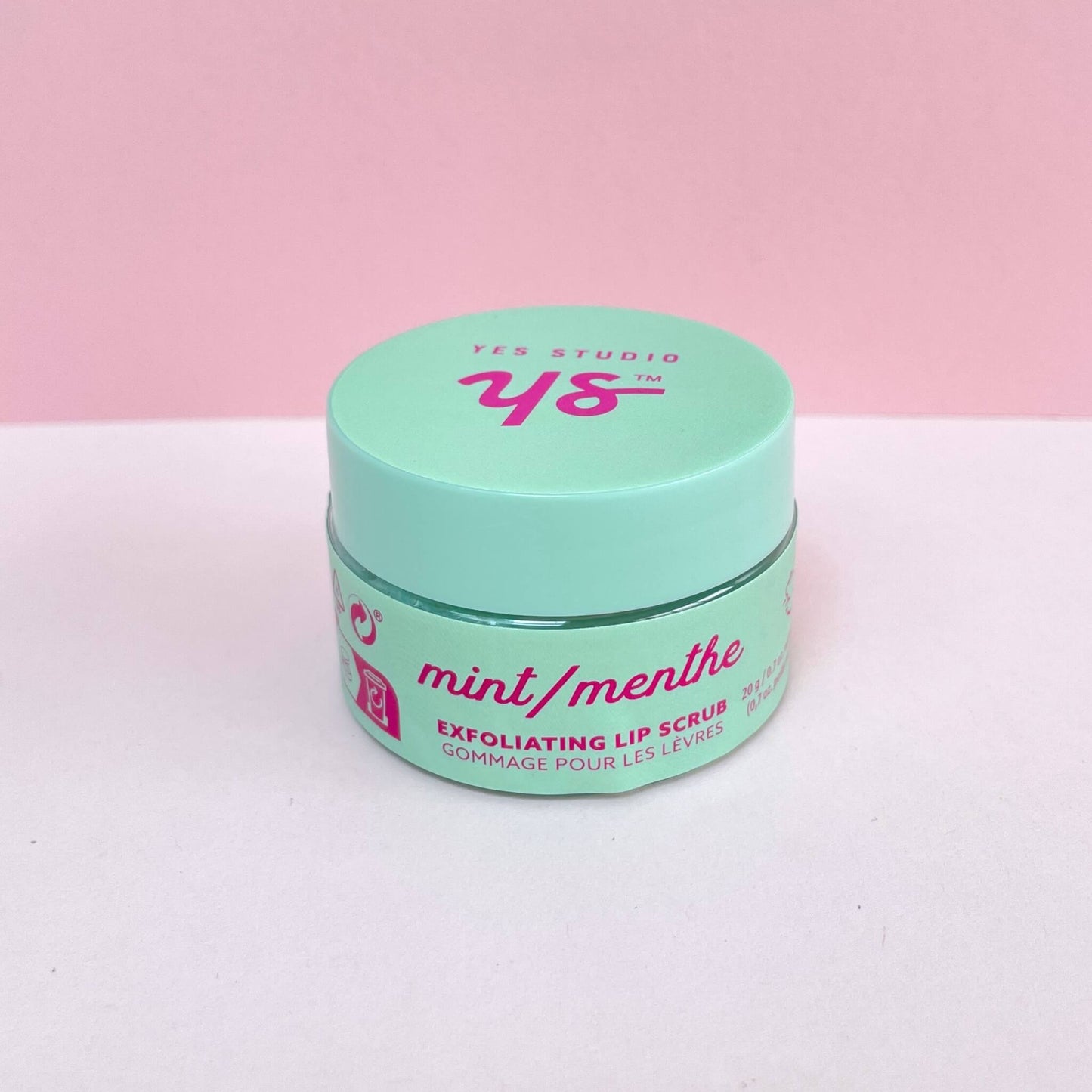 Green pot of exfoliating mint lip scrub