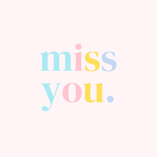 Pink 'miss you' notecard with multicoloured text