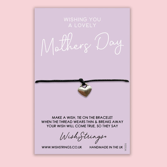 Silver heart charm bracelet on black string packaged on purple Mother's Day backing card with a poem.