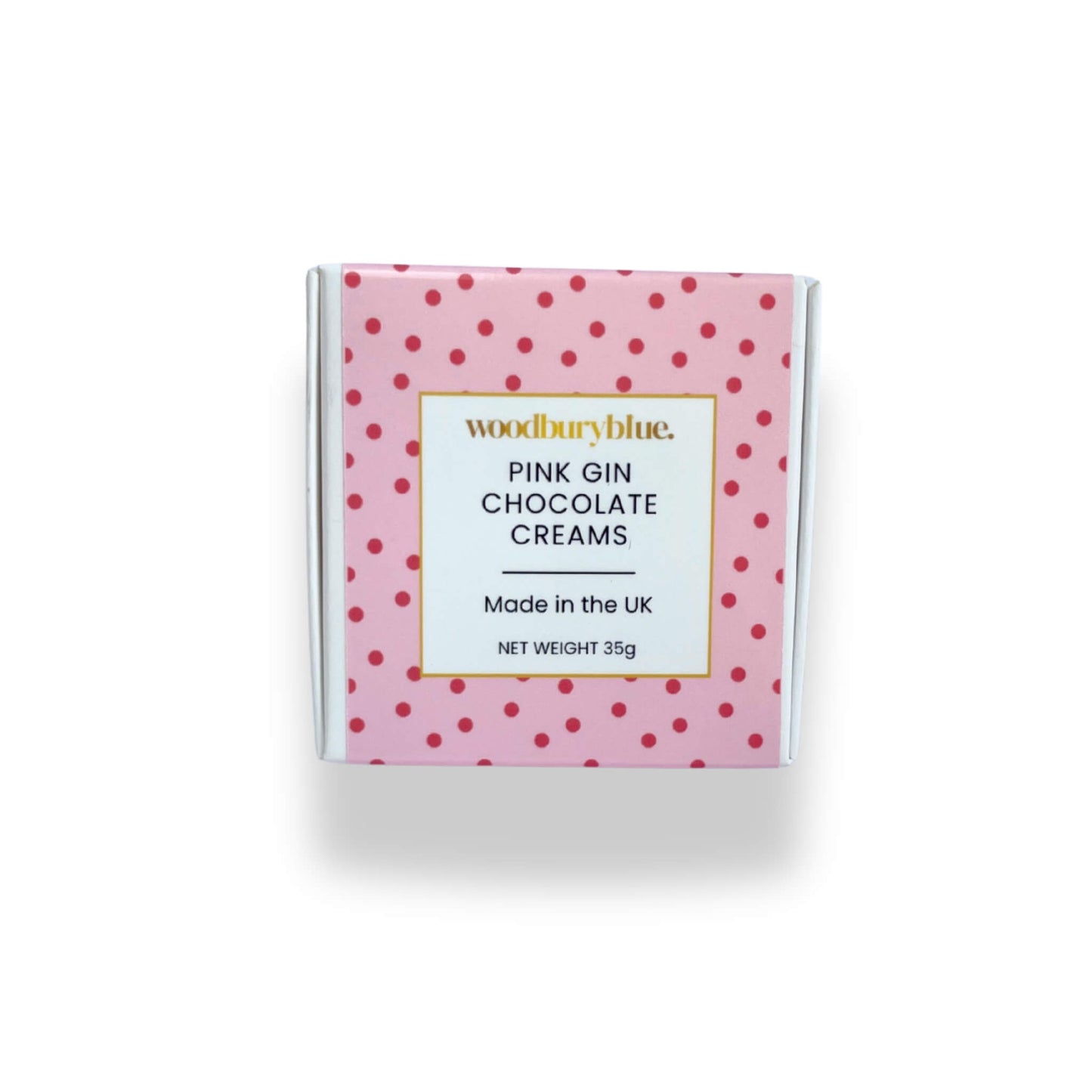 Pink polka dot box of Woodbury Blue Pink Gin Chocolate Creams on a white background