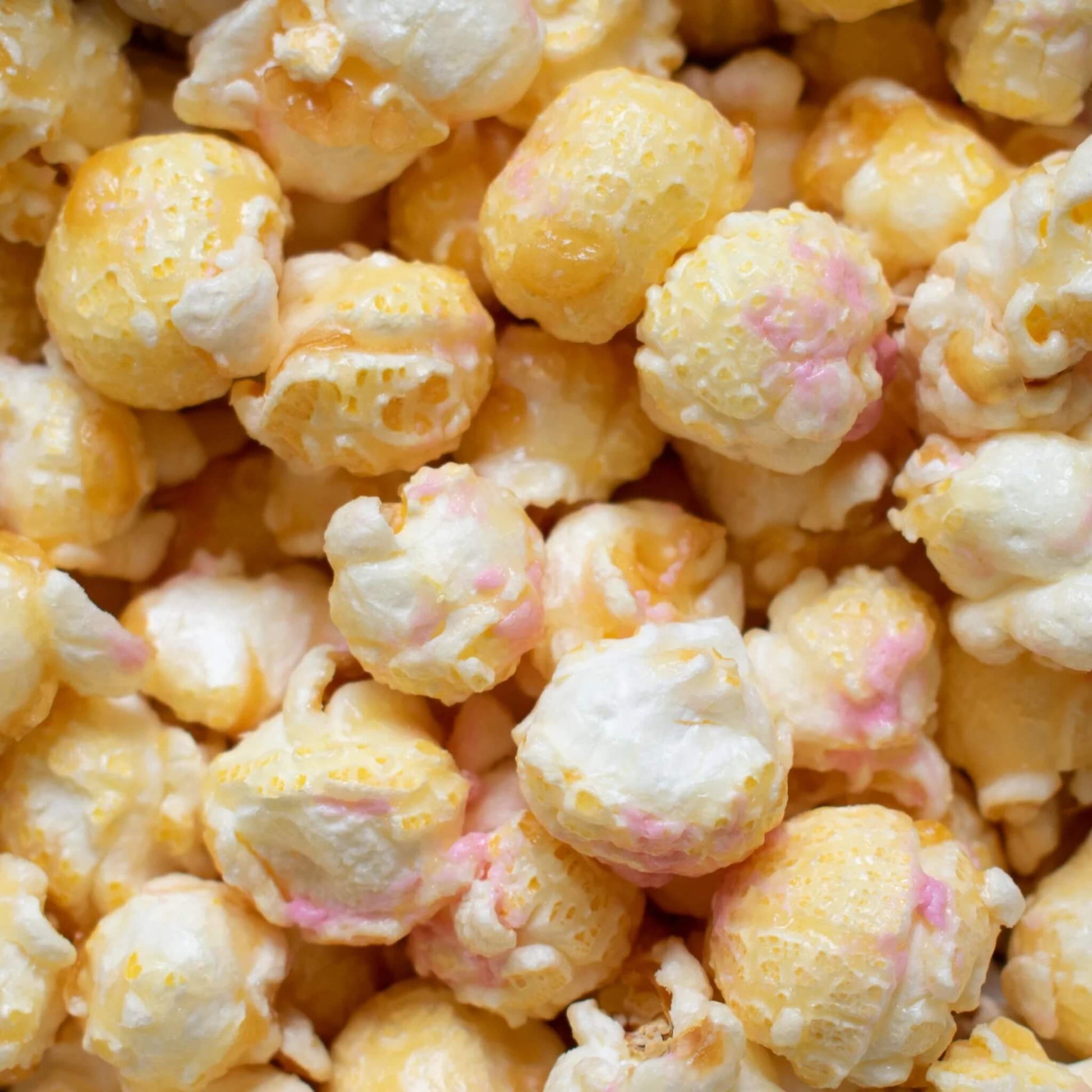 Close-up of Popcorn Shed Vegan Toasted Marshmallow popcorn showing caramel coating and melted marshmallow pieces.
