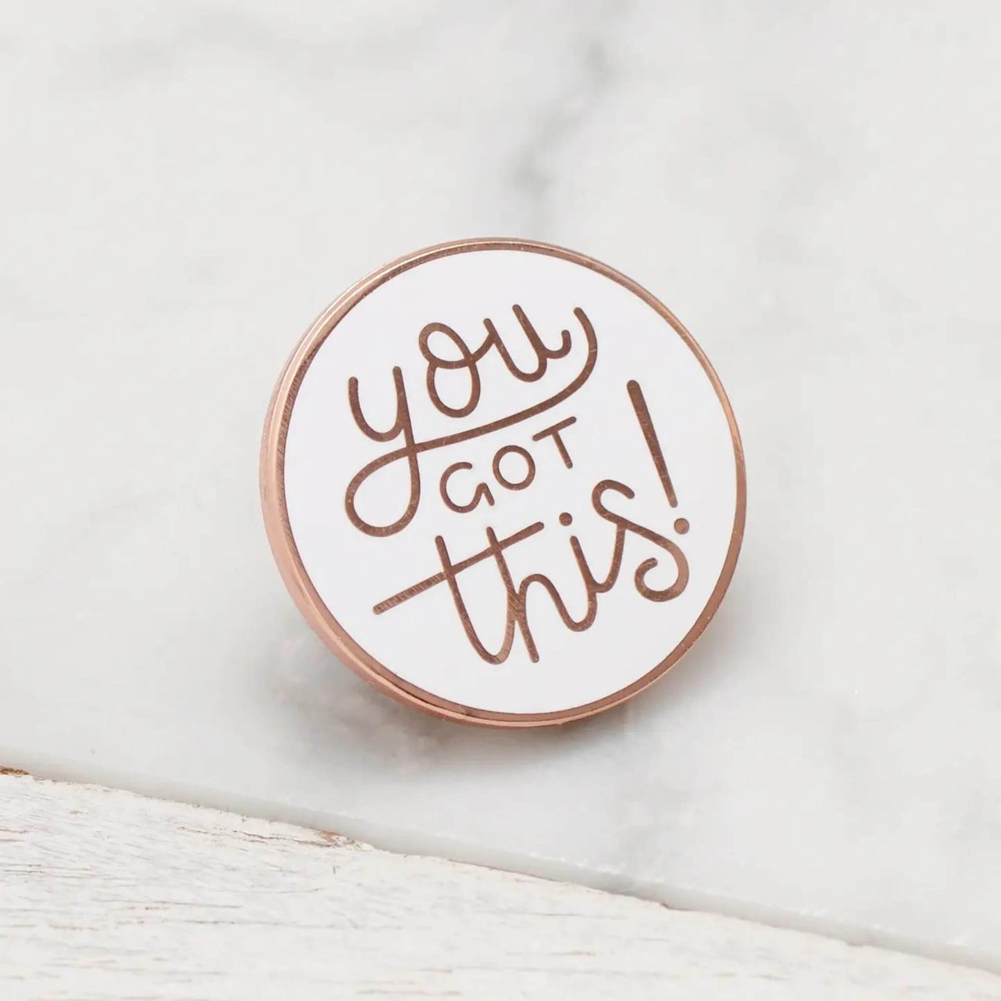 You Got This enamel pin badge in white with gold writing
