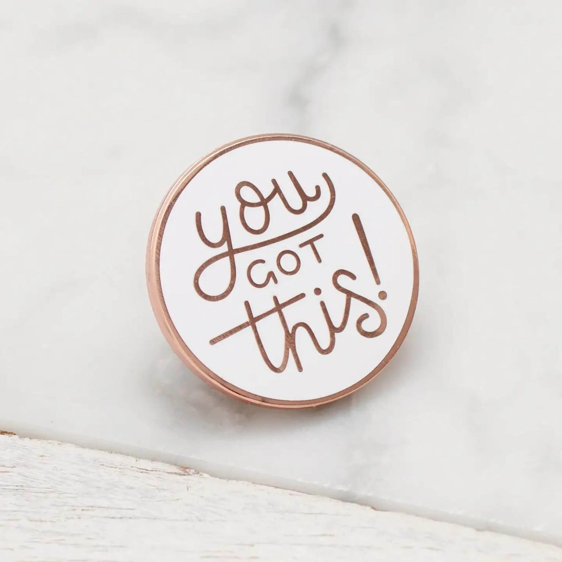 You Got This enamel pin badge in white with gold writing