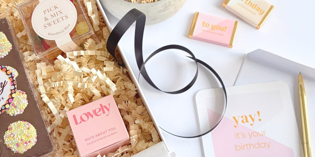 Last-minute birthday gift box with chocolates, sweets and a handwritten birthday card, beautifully packed and ready to send