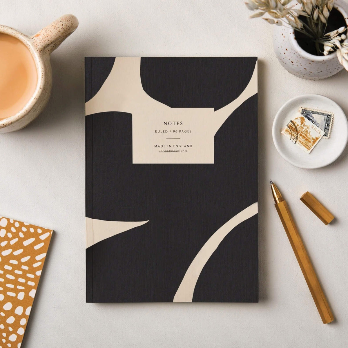 Abstract black and cream A5 ruled notebook with linen embossed cover by Ink & Bloom Paper Co