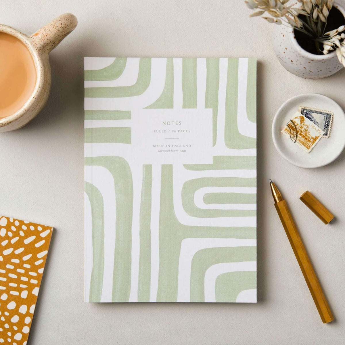 Abstract pale green A5 ruled notebook with linen embossed cover by Ink & Bloom Paper Co
