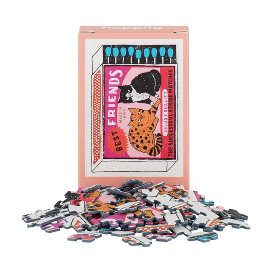 Best Friends Matches 99 piece mini jigsaw puzzle by Happily Puzzles with colourful pieces and pink box