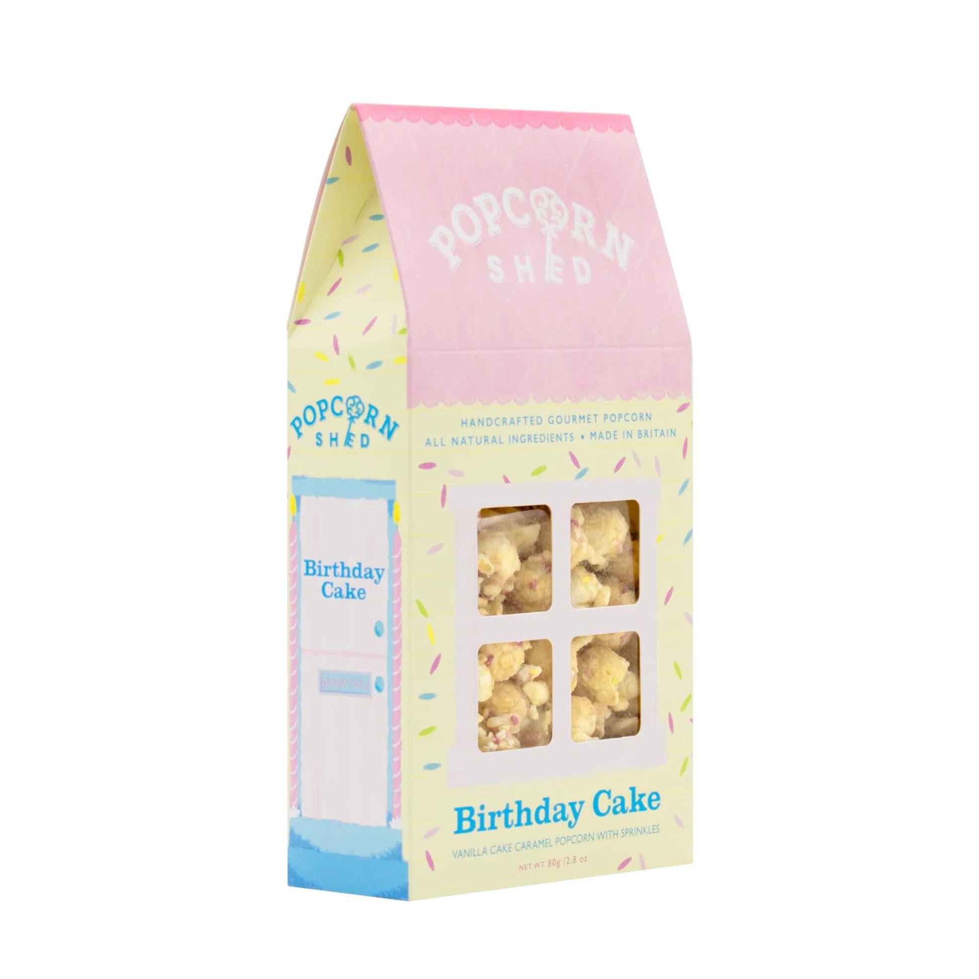 Angled popcorn box from Popcorn Shed with birthday cake flavour on a white background