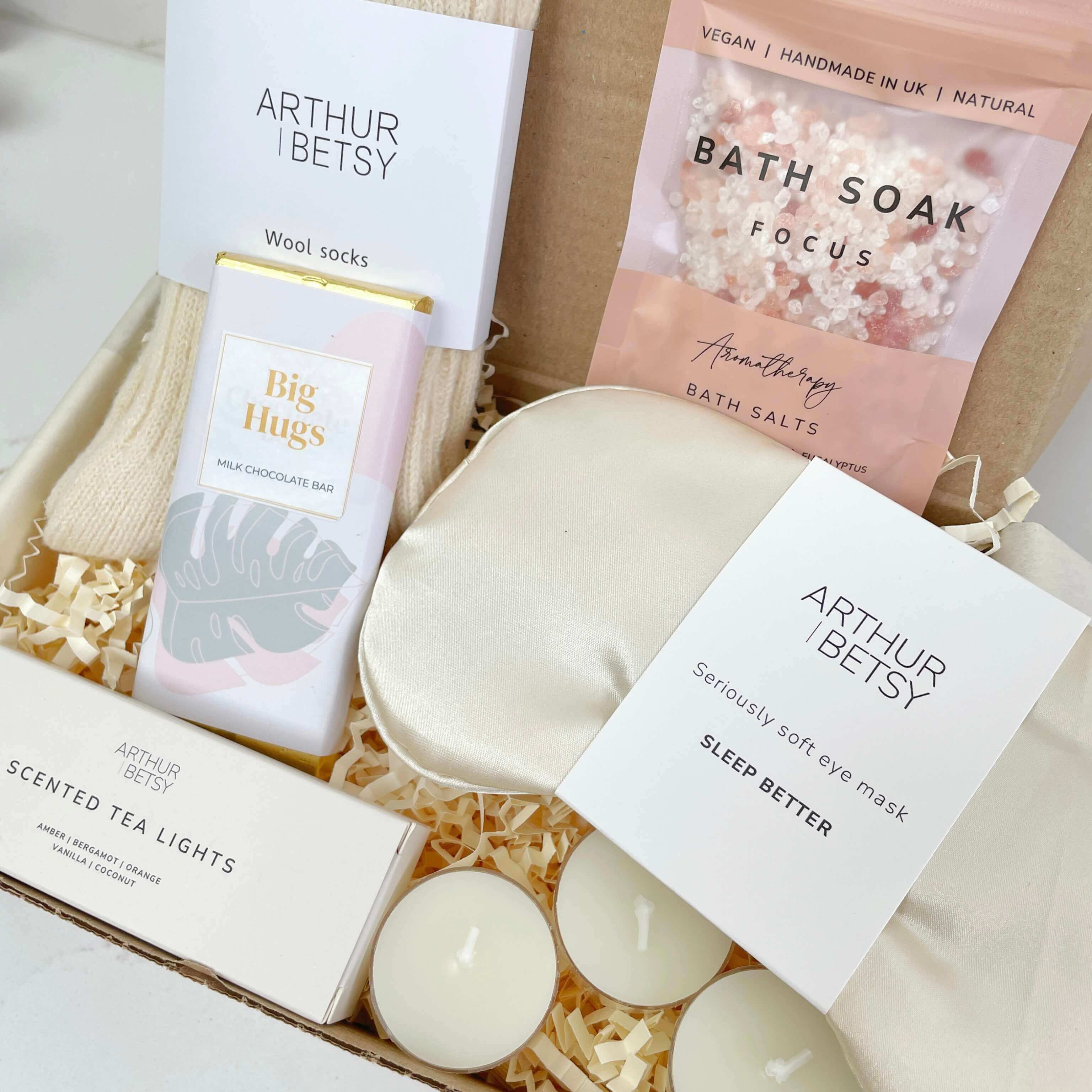 A collection of self care gifts arranged in a gift box, perfect for gifting to loved ones and friends.