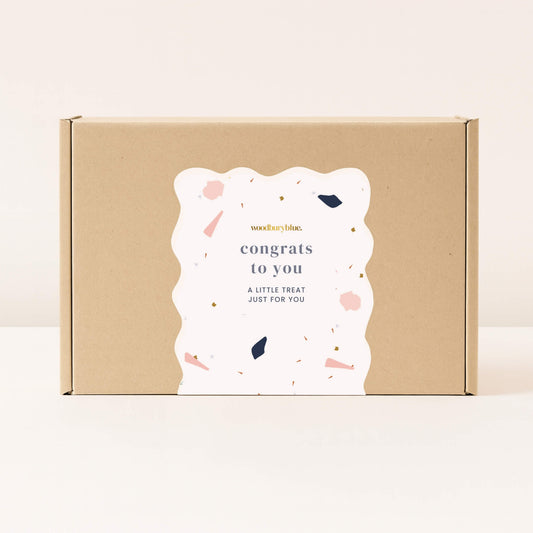 Kraft gift box with terrazzo style congrats to you sticker from Woodbury Blue