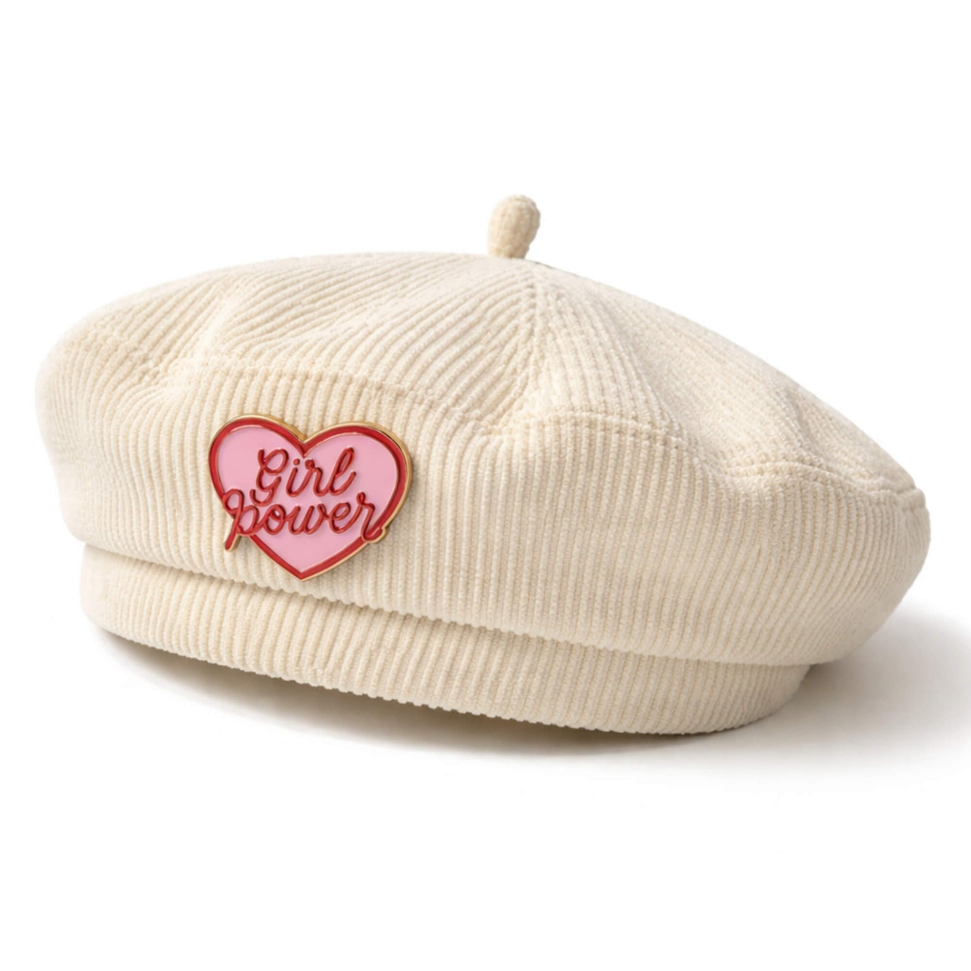 Girl Power heart enamel pin badge worn on a cream cord beret