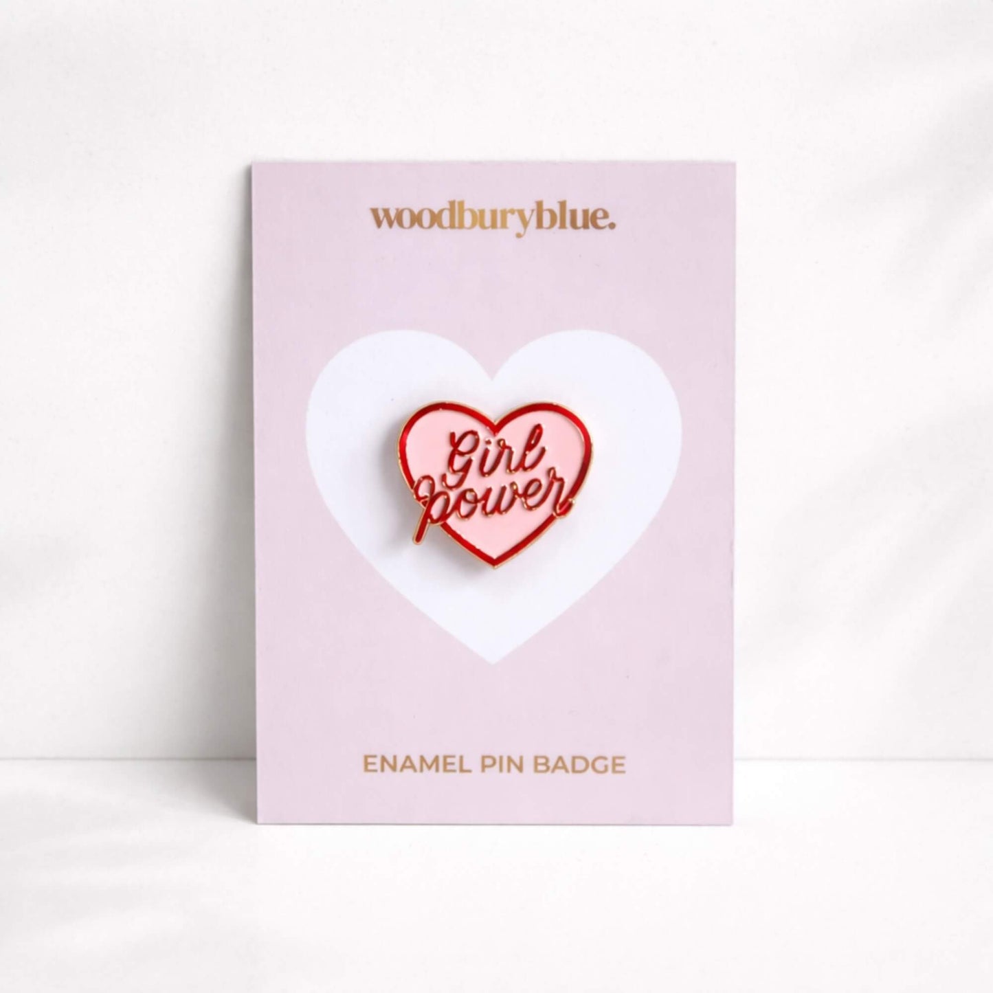 Girl Power heart enamel pin badge on soft pink Woodbury Blue backing card, empowering gift idea for her
