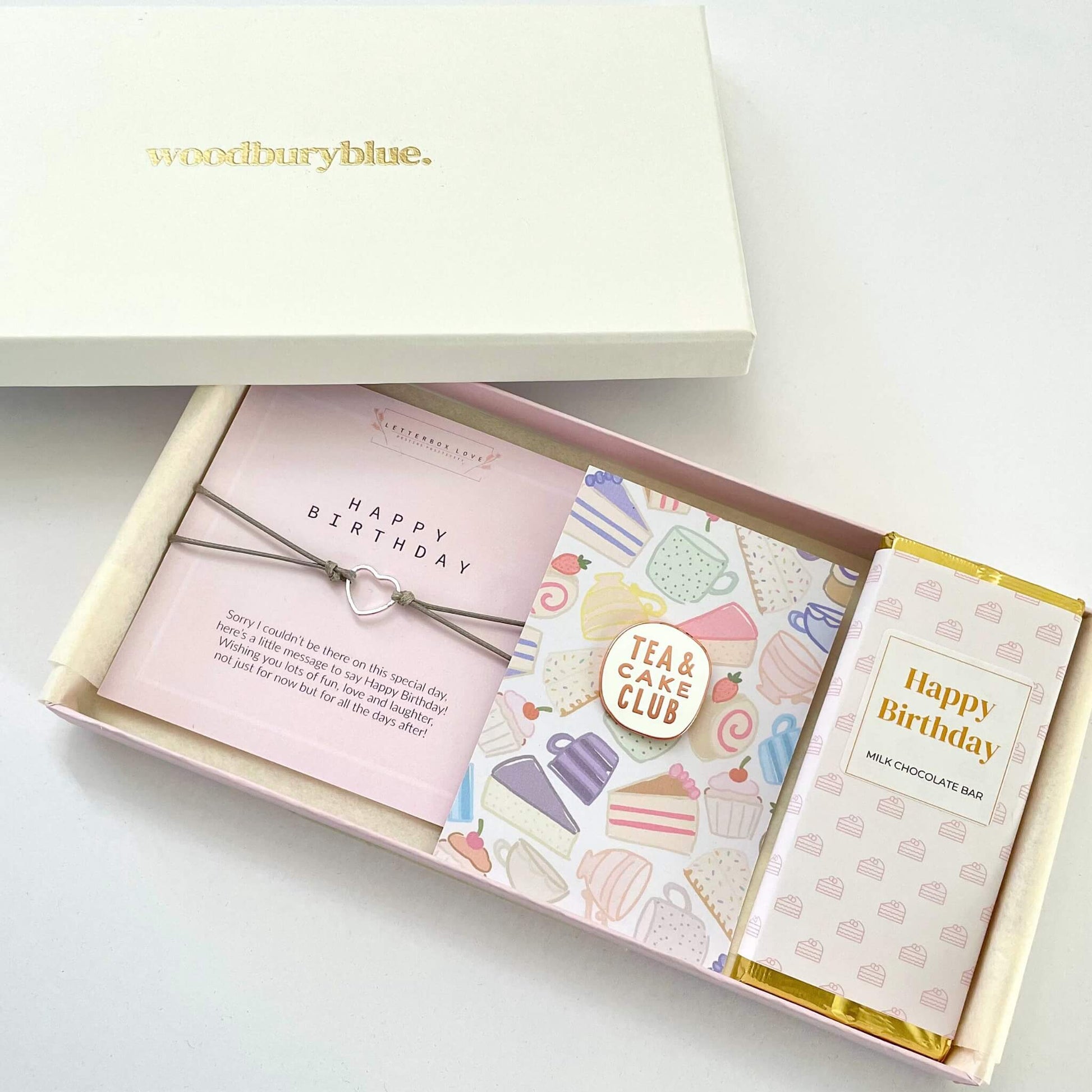 Happy birthday in a letterbox - includes chocolate, a birthday bracelet and a birthday badge