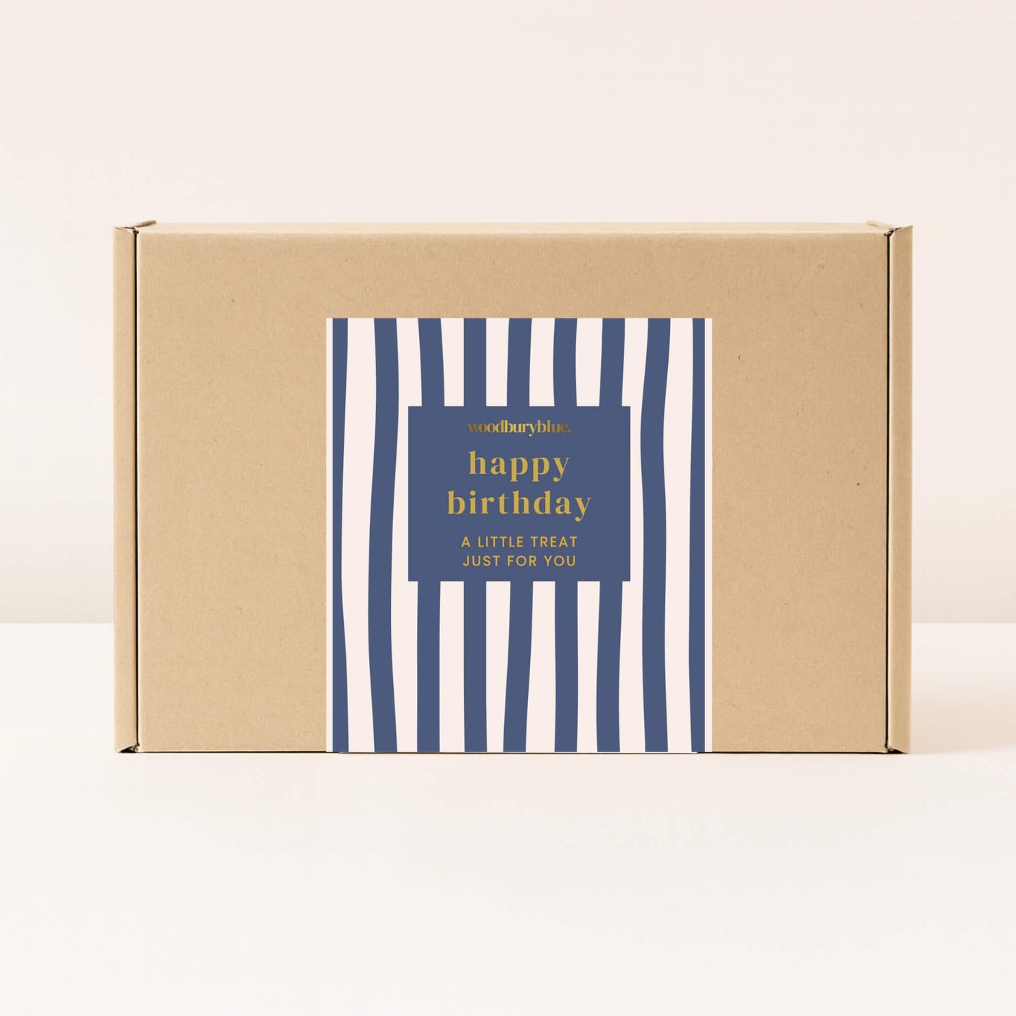 Kraft gift box with navy wavy stripe happy birthday sticker from Woodbury Blue