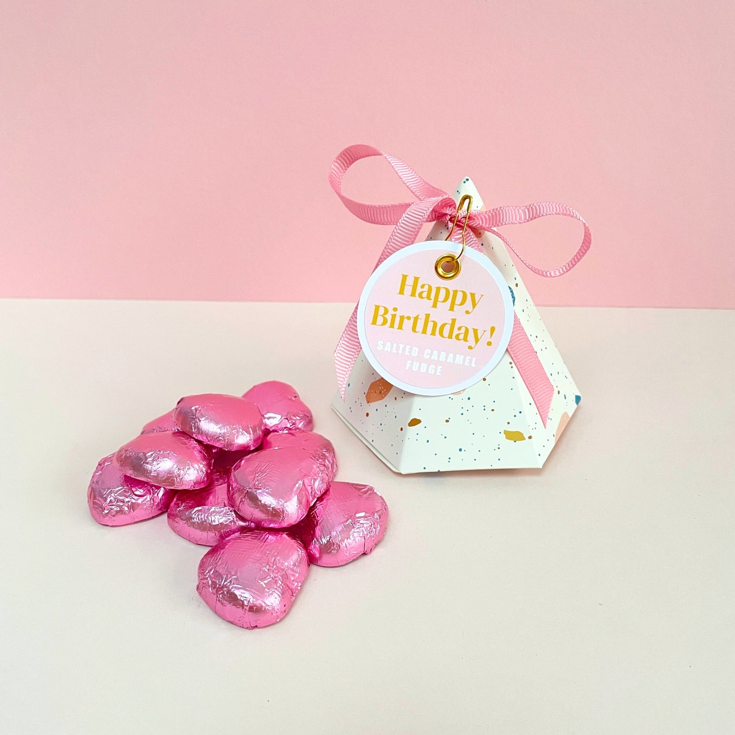 Pyramid style happy birthday gift box with pink foiled milk chocolate hearts