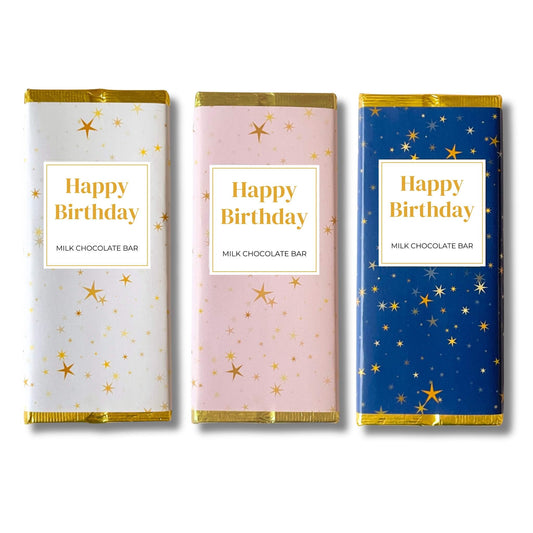 Special occasion milk chocolate bars with a happy birthday sticker in pink, blue and navy