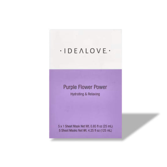 Purple flower power facial sheet mask on a white background