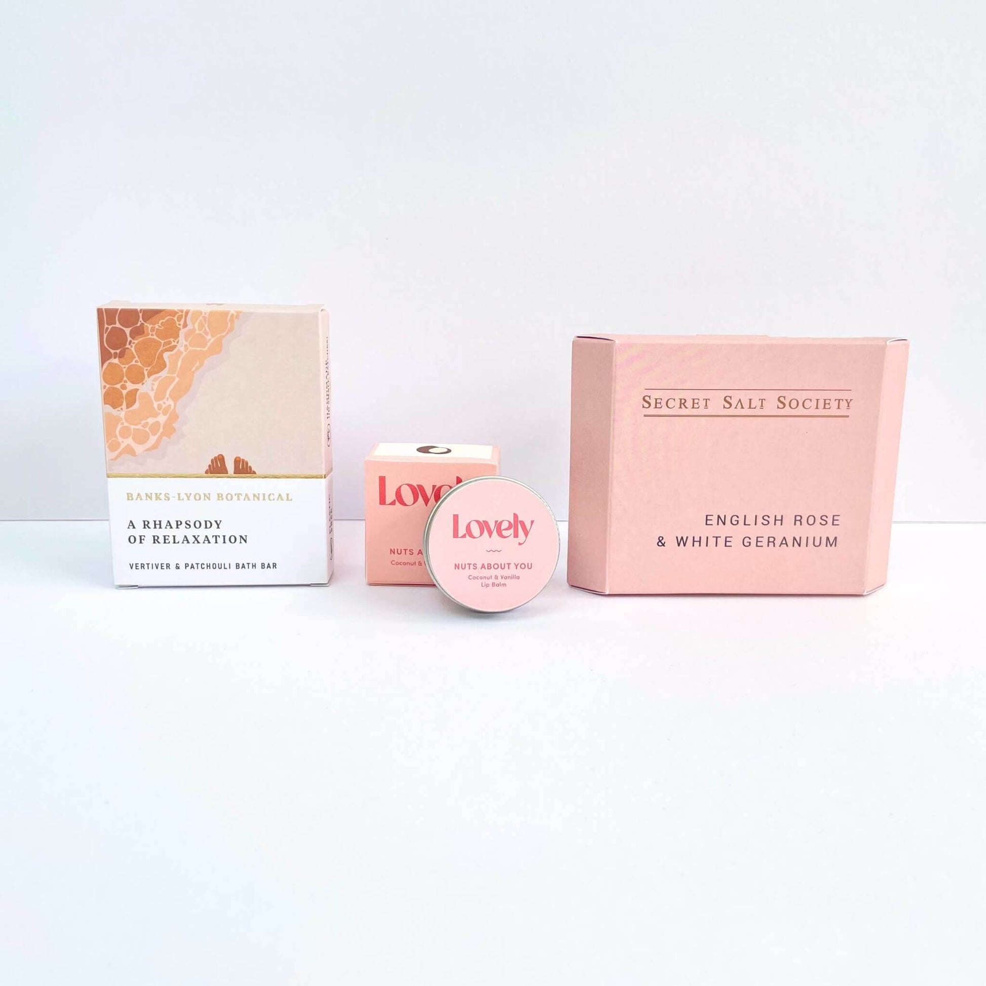 Little box of kindness includes lip balm, bath oil bar and bath infusion