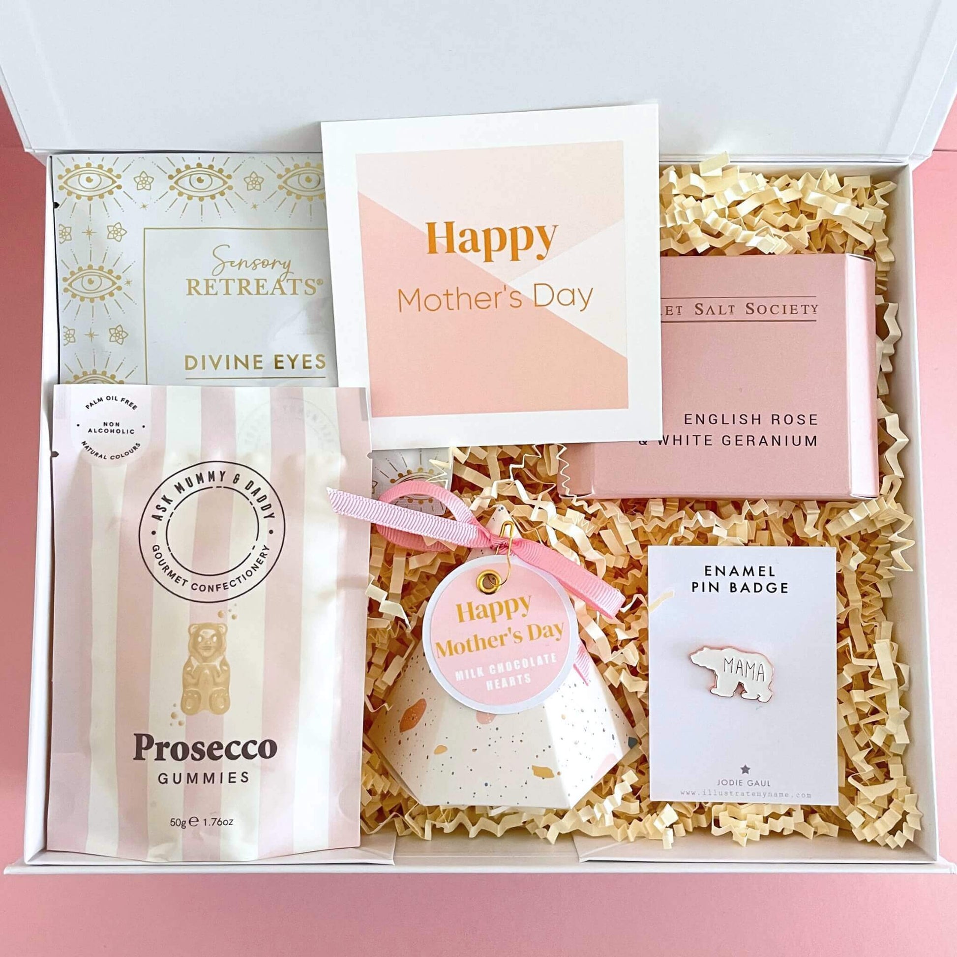 Luxury gift box filled with pink and white themed treats for Mother's Day