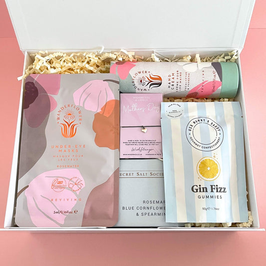 Luxury gift hamper filled with self care items and sweet treats for mother's day