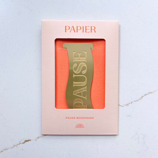 Front view of the Papier Brass 'Pause' Bookmark in its presentation packaging.