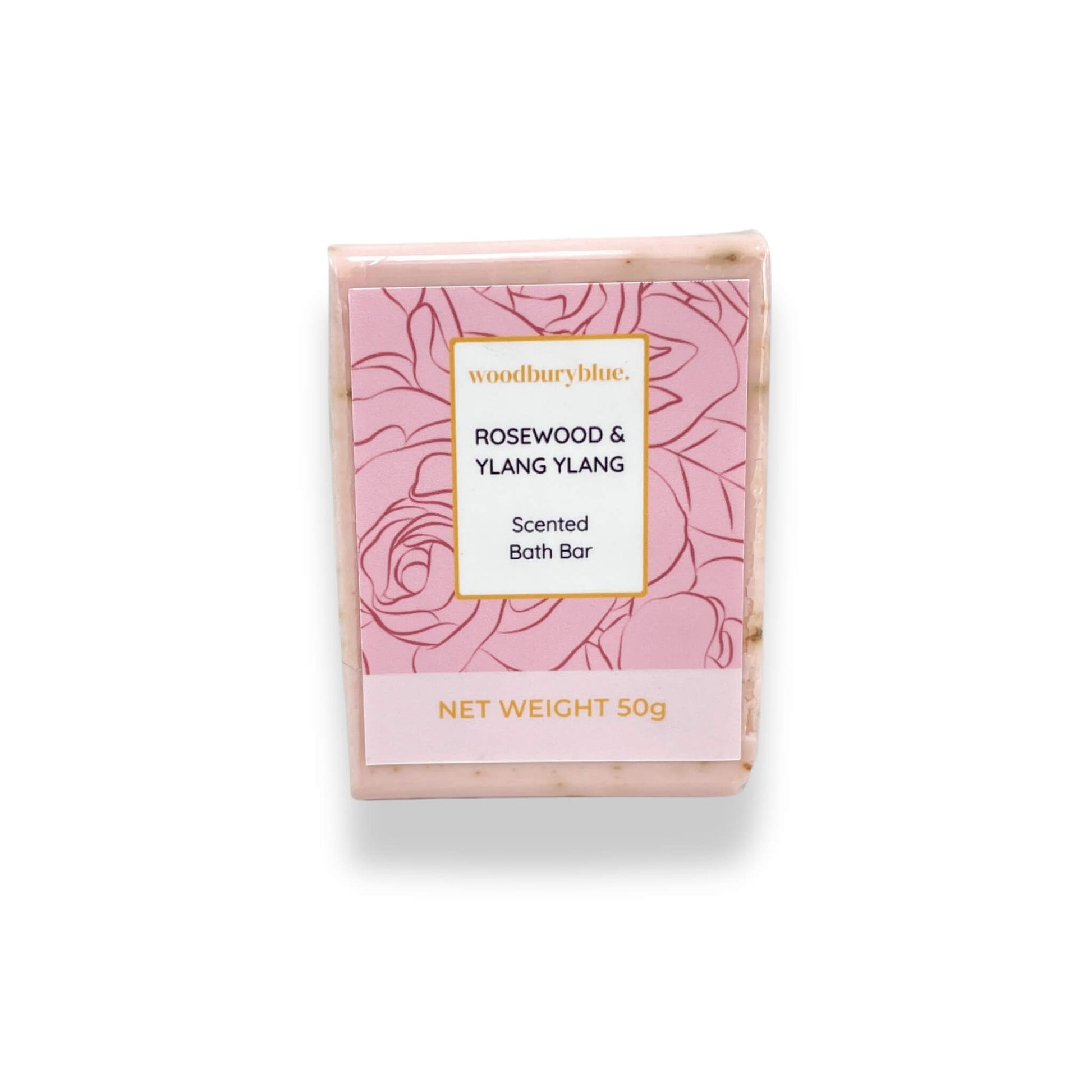 Rosewood and Ylang scented bath bar with pink floral design on a white background