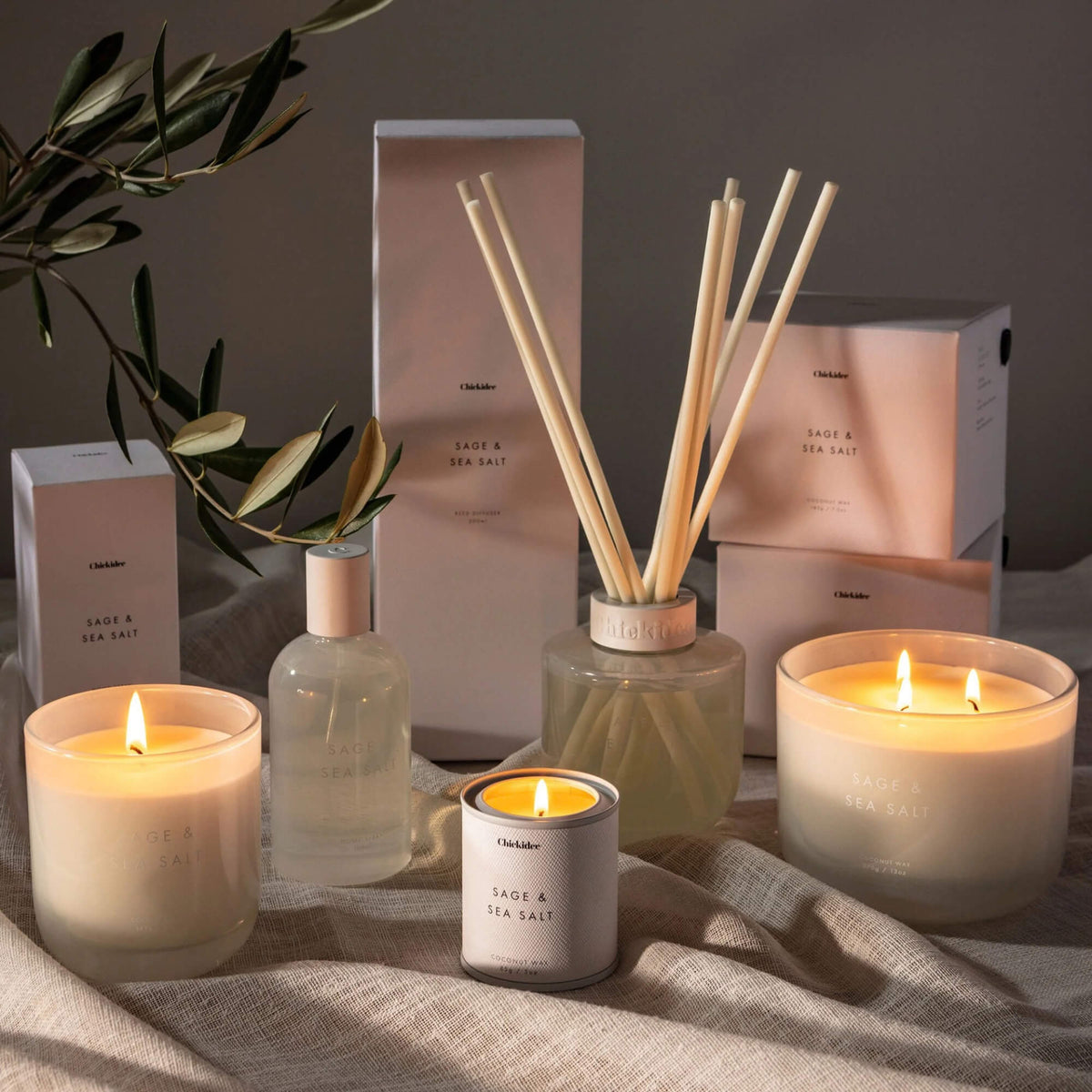 Sage & Sea Salt home fragrance collection with room spray, reed diffuser and lit candles