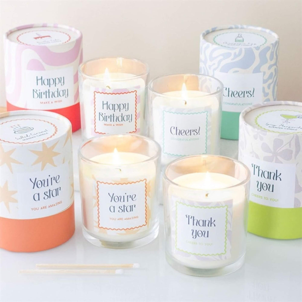 Something Different celebration scented candle range including Happy Birthday Thank You Cheers and You’re a Star candles