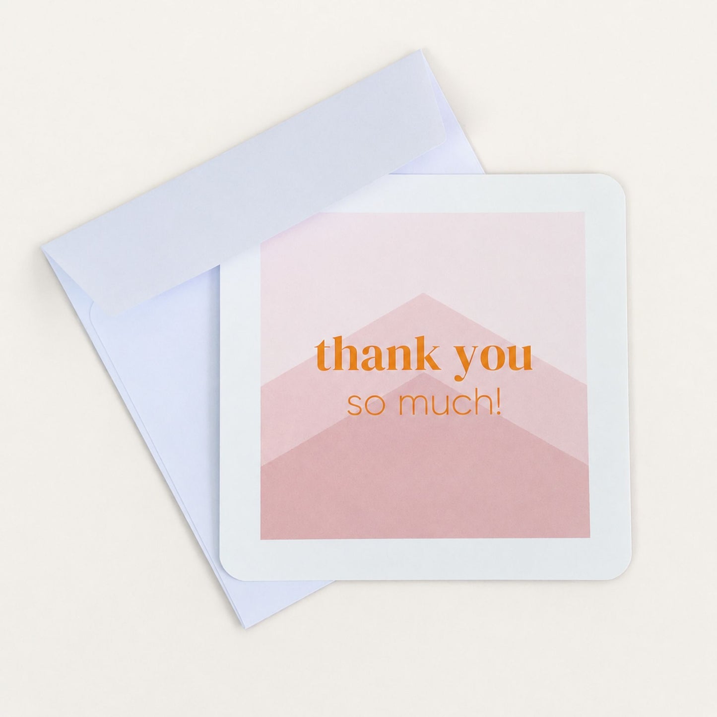 Thank you notecard with white envelope featuring a pink design and orange thank you so much text for Woodbury Blue gifts