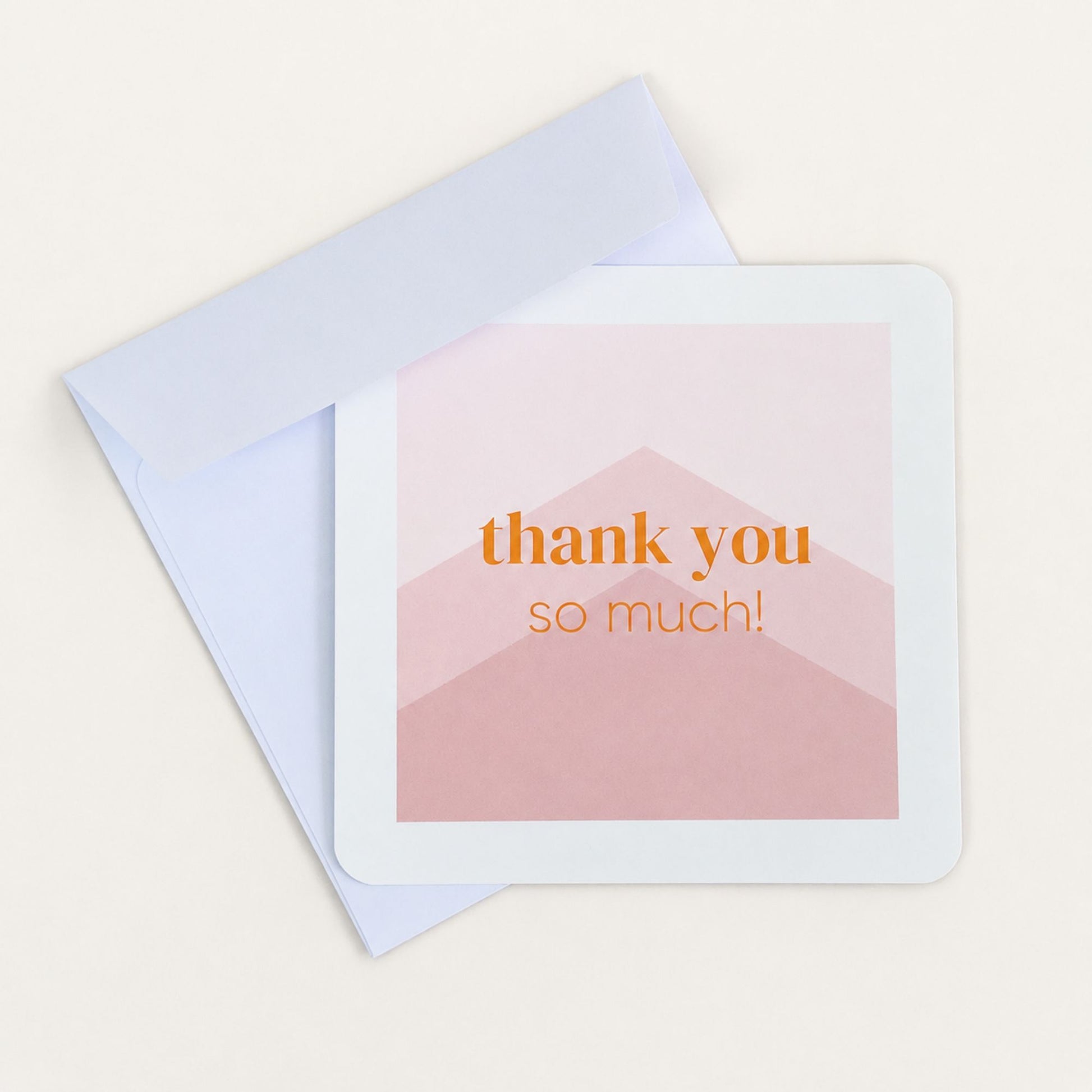 Thank you notecard with white envelope featuring a pink design and orange thank you so much text for Woodbury Blue gifts