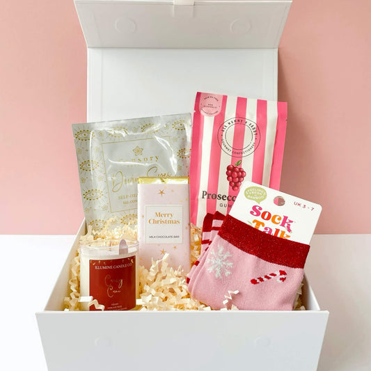 Merry Christmas curated gift box filled with Christmas themed presents