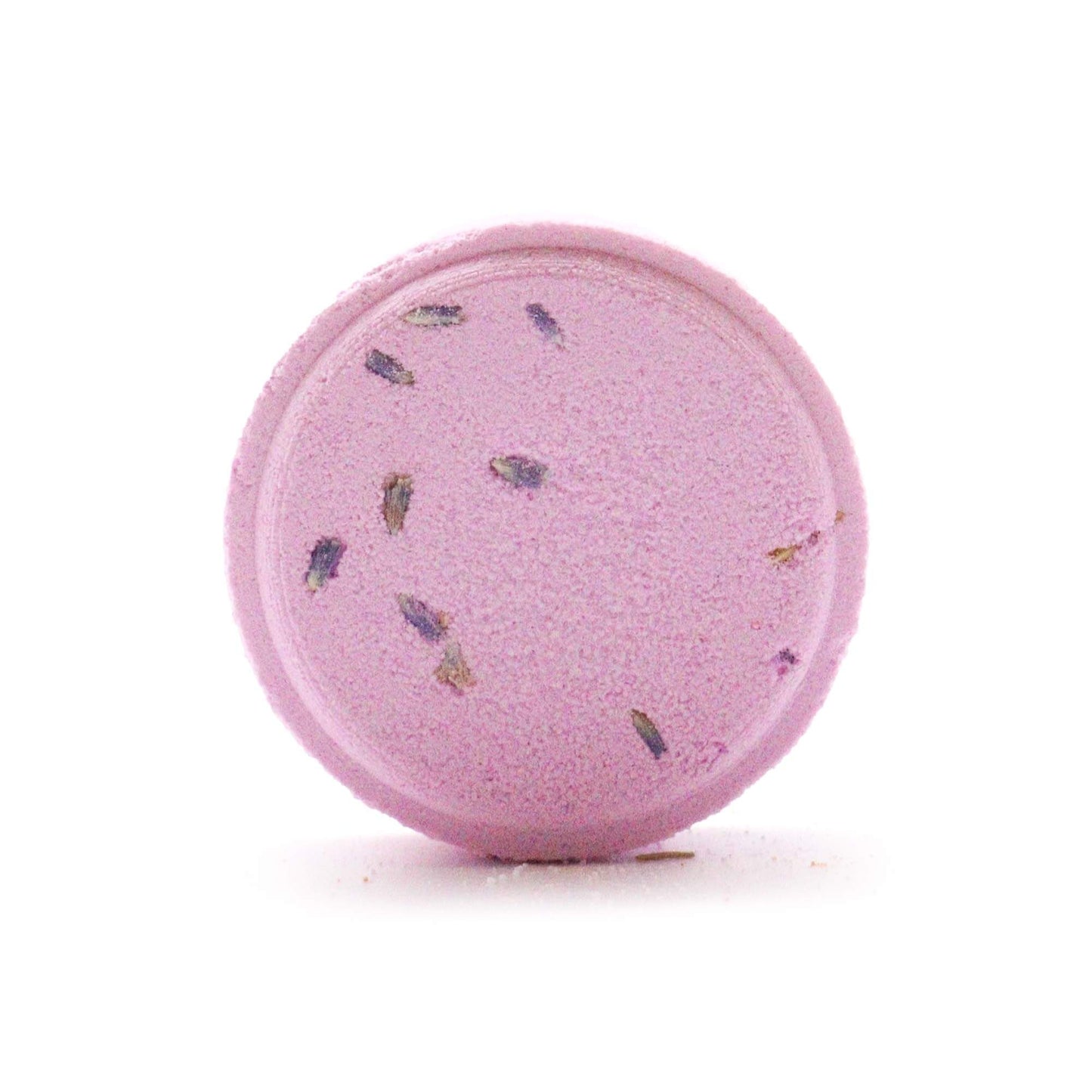 Unwrapped lavender-infused aromatherapy shower steamer with visible flower buds