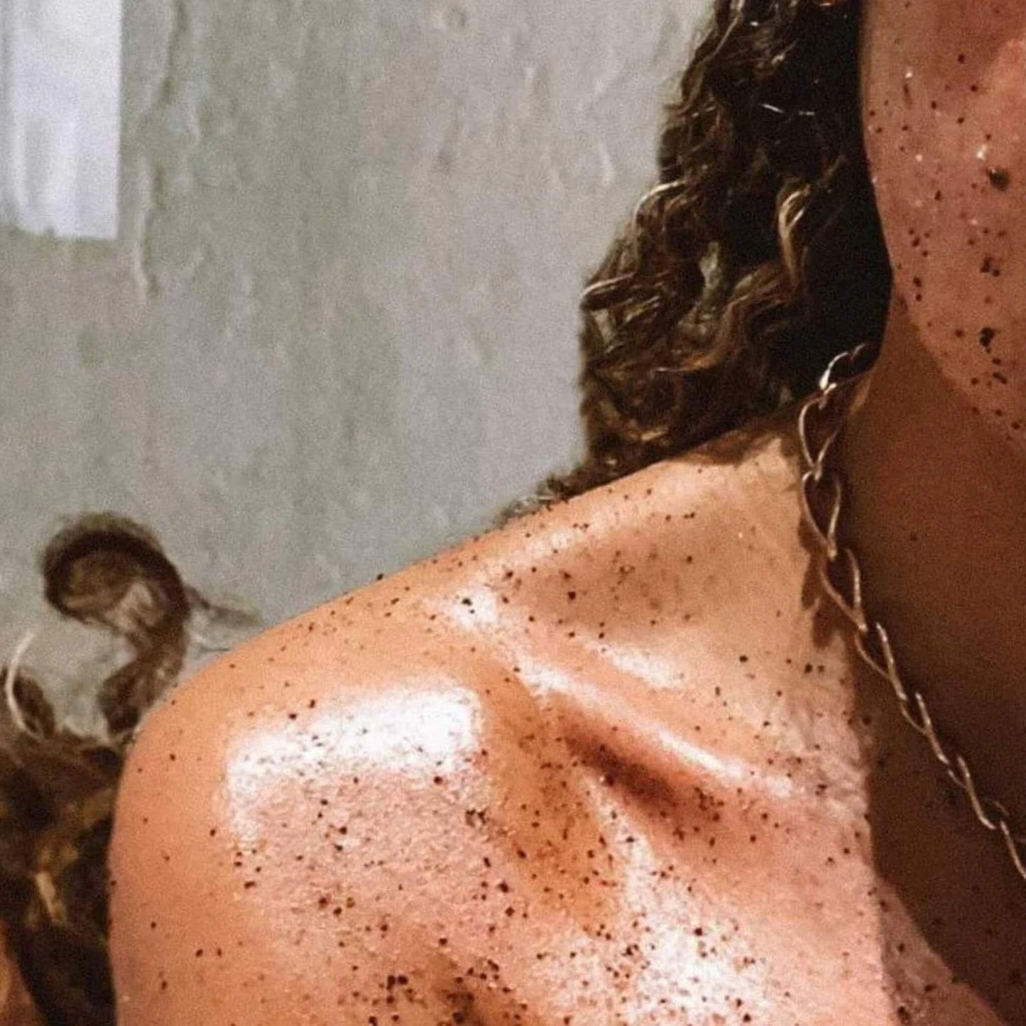 Close-up of vanilla coffee scrub on skin – gently exfoliates and hydrates for a radiant glow