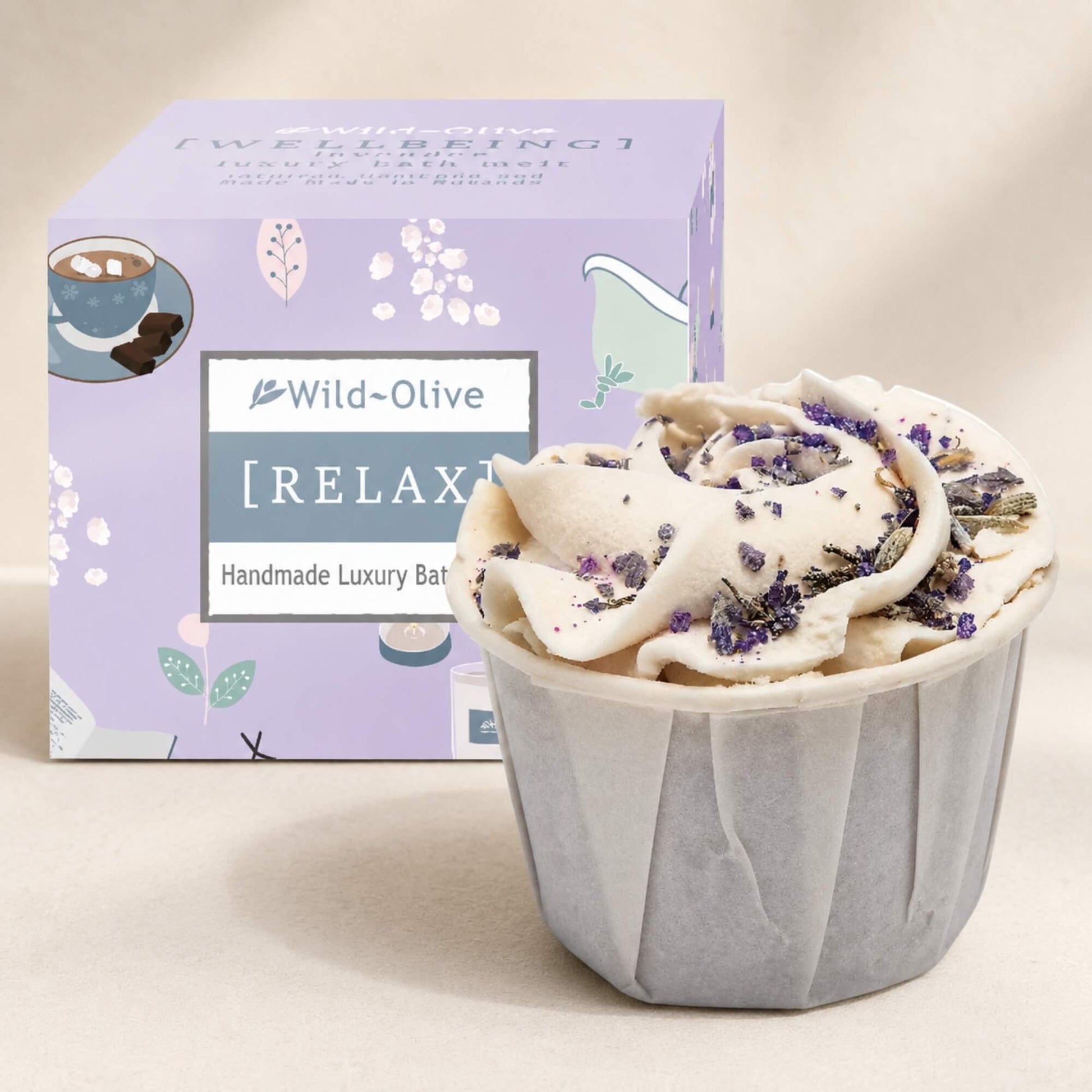 Wild Olive Relax lavender cupcake bath melt with creamy whipped topping, dried lavender pieces and matching purple gift box.