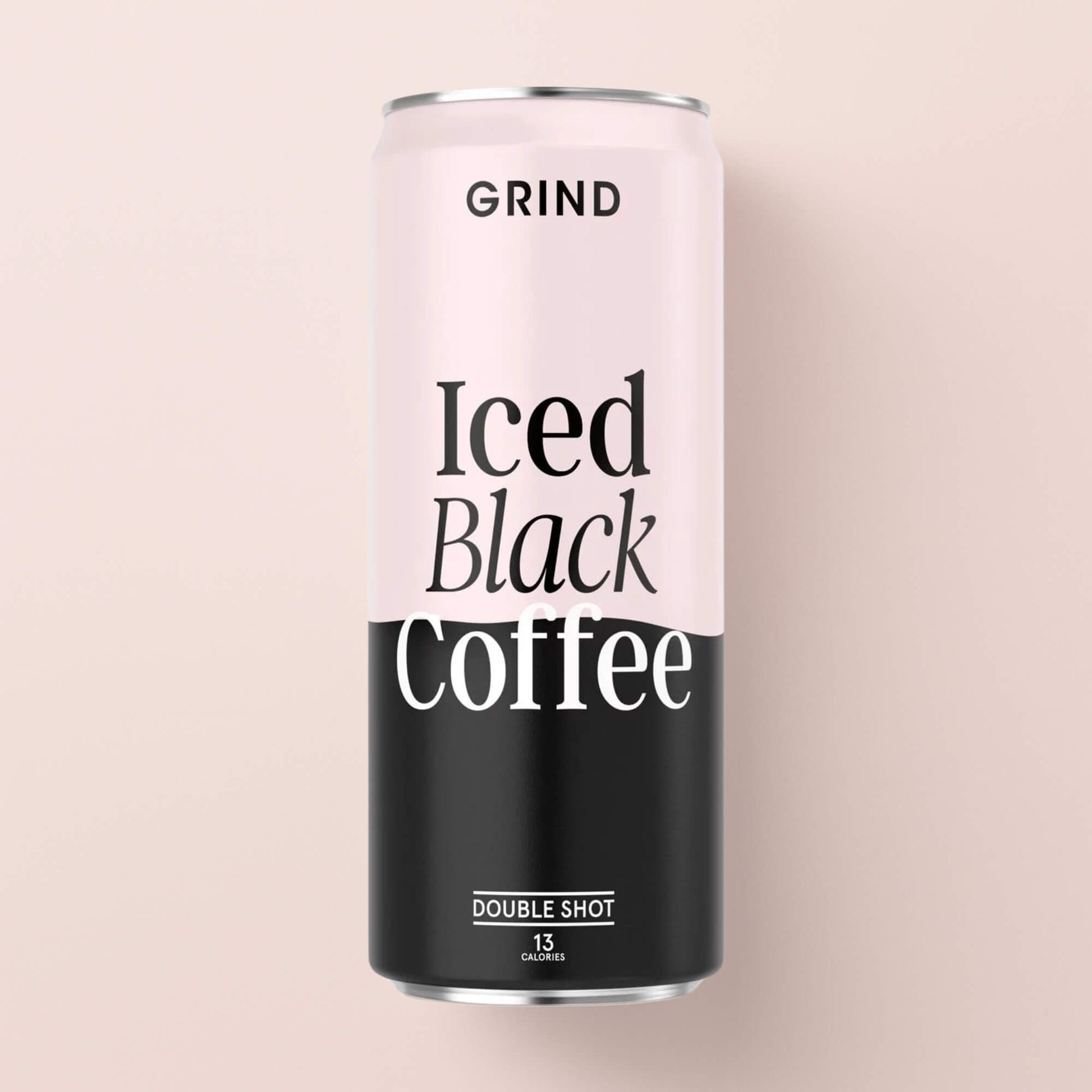 Front view of the Grind Iced Black Coffee 250ml can against a soft pink background, showing the label design and double shot marking.
