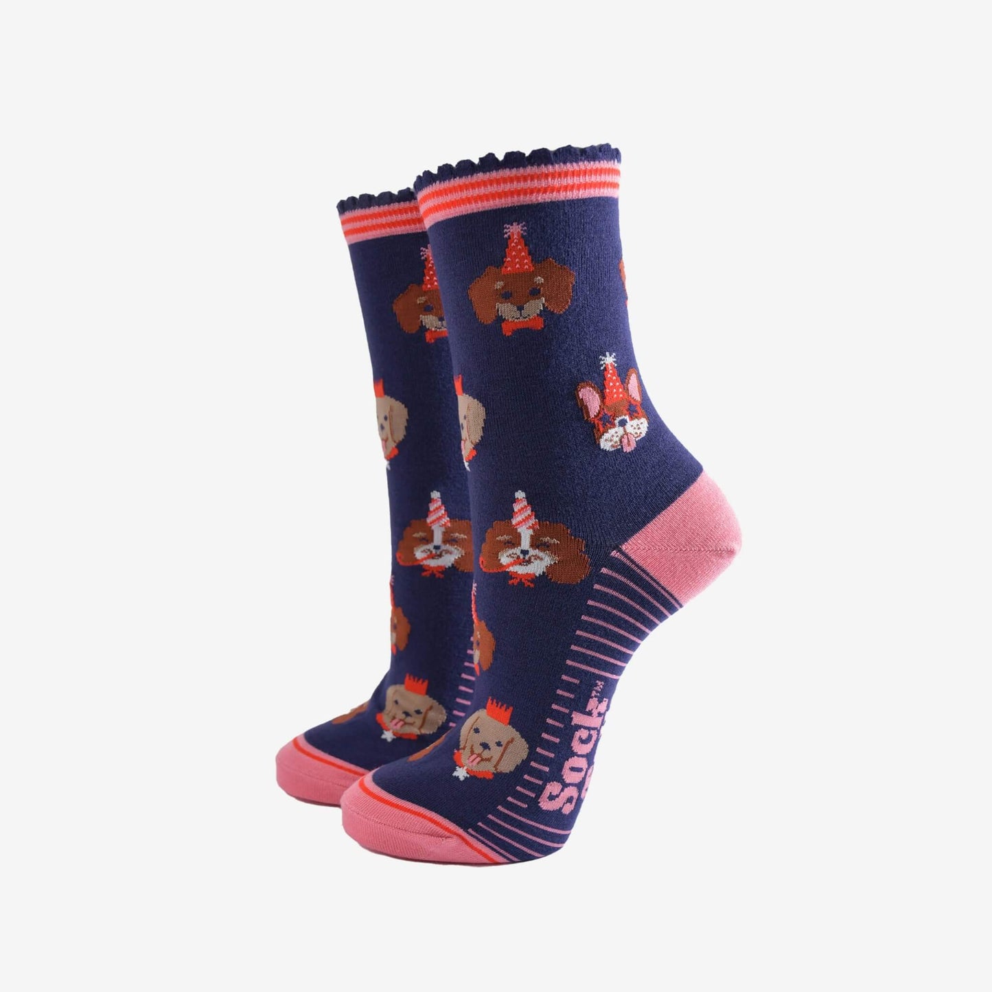 Pair of navy and pink Party Dogs bamboo socks with fun dog and party hat design by Sock Talk