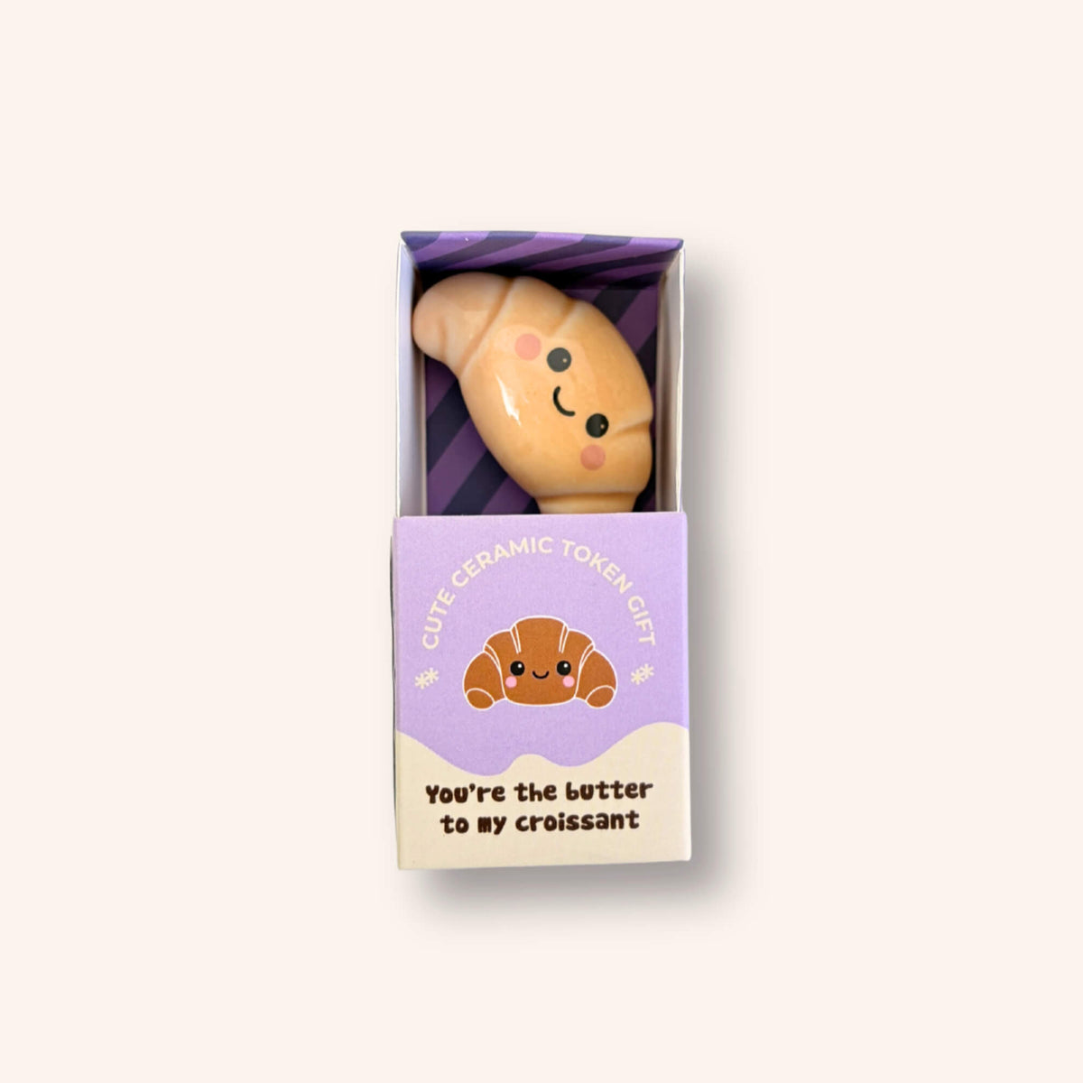 You’re the Butter to My Croissant ceramic croissant token inside an open lilac matchbox-style gift box